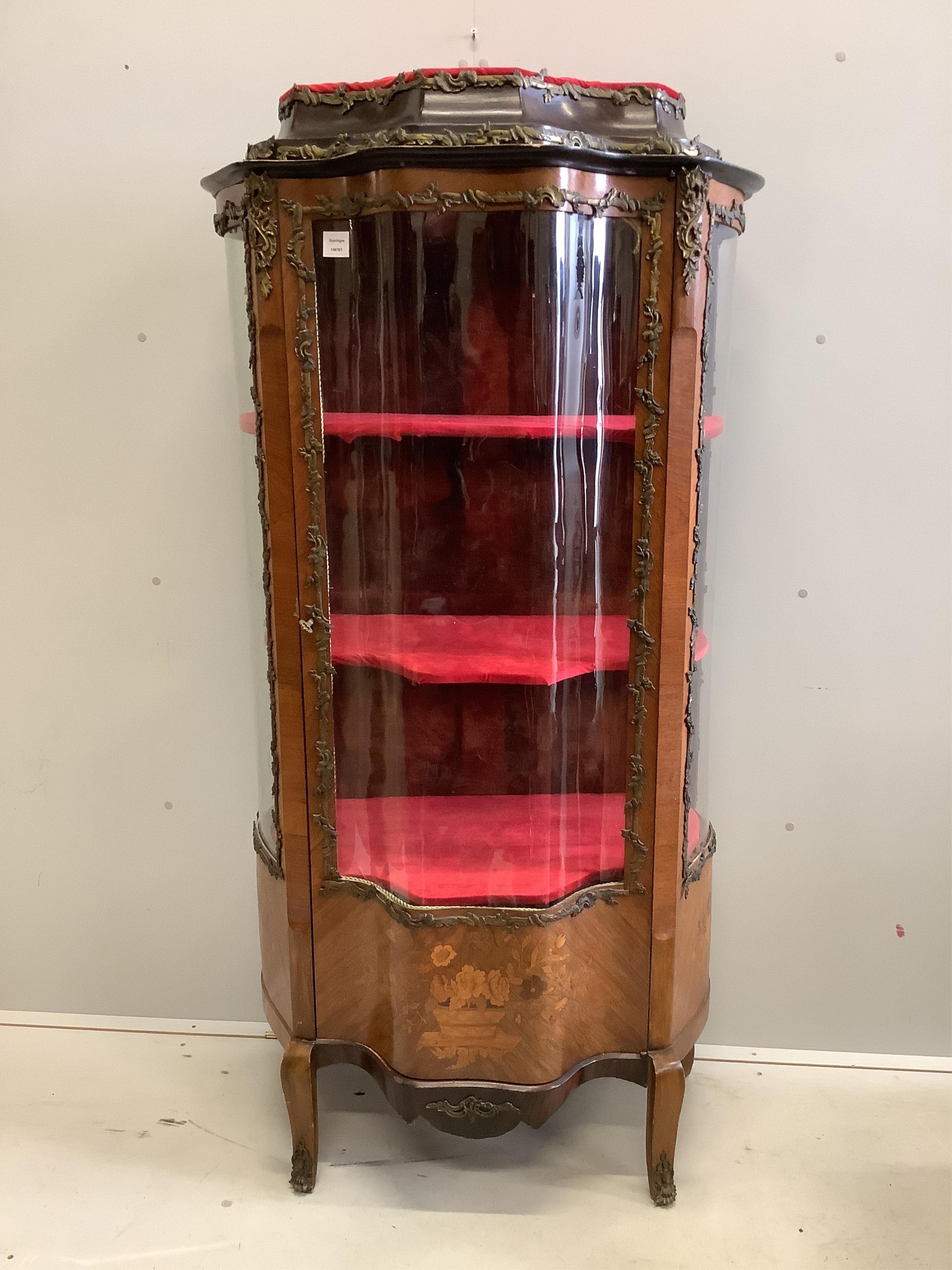 A gilt metal mounted and marquetry inlaid French kingwood vitrine, width 82cm, depth 47cm, height 165cm. Condition - fair